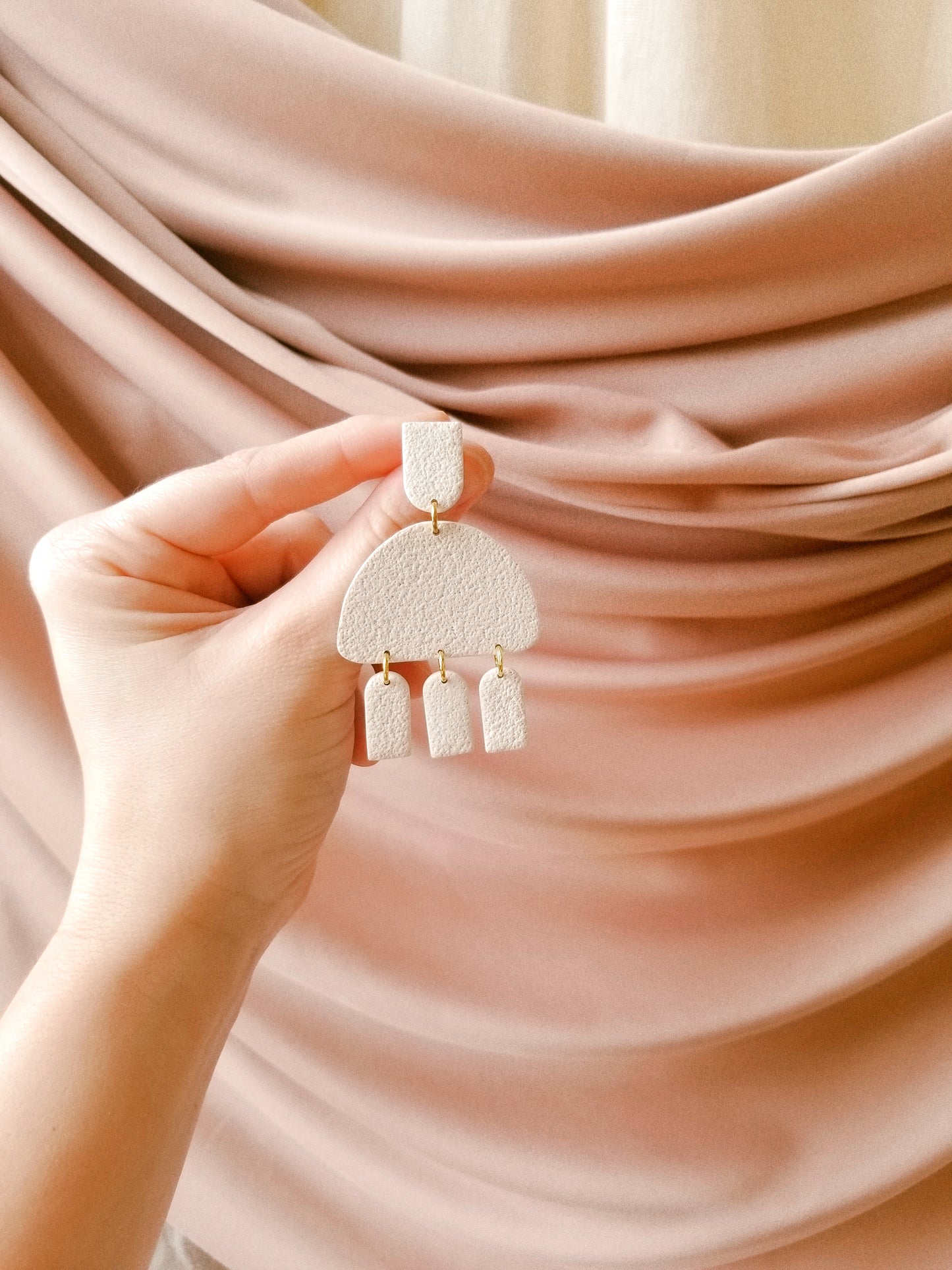 rounded arch dangles