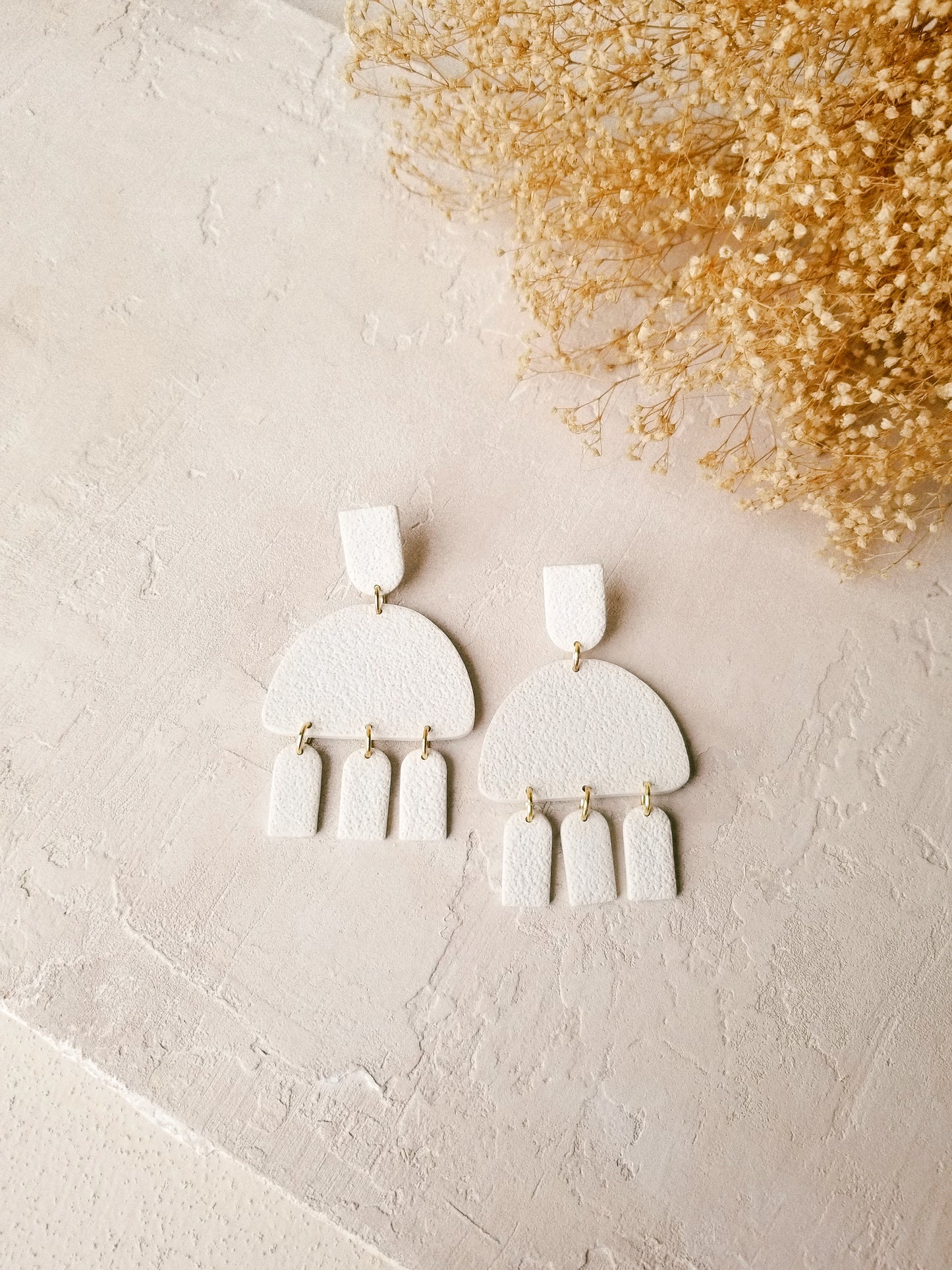 rounded arch dangles