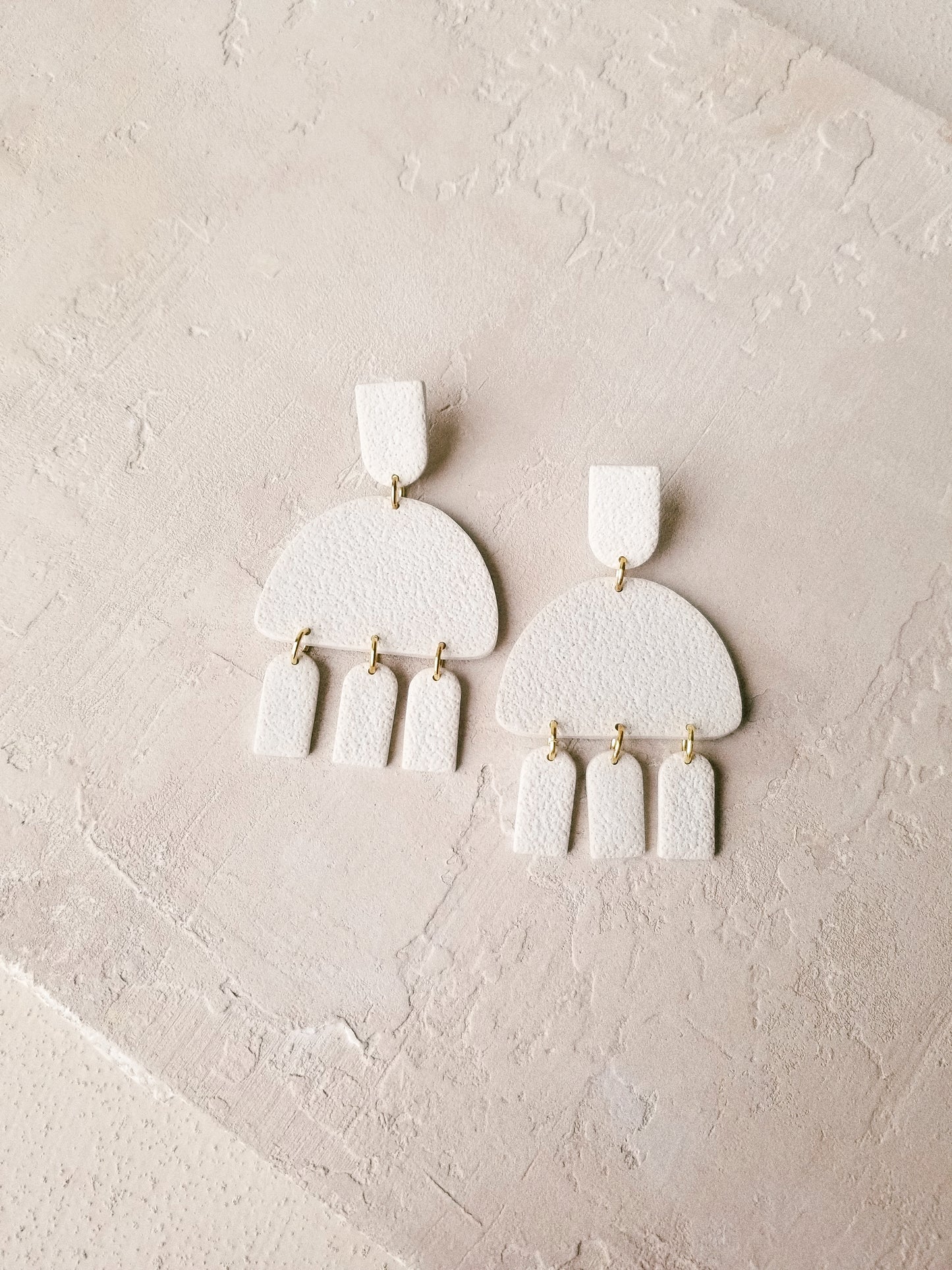 rounded arch dangles